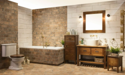 Koupelna v rustikálním stylu s vestavnou vanou, dřevěným nábytkem, umyvadlem na desce a obklady v cihlovém dekoru