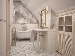 Podkrovní koupelna v provence stylu s volně stojící vanou, zdobeným zrcadlem, světlou skříní a dekorativní vzorovanou dlažbou