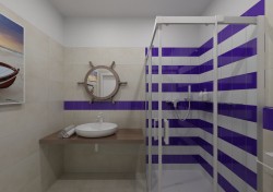 Koupelna s béžovými obklady a výraznými fialovými pruhy ve sprše, dřevěnou deskou pod umyvadlem a kulatým zrcadlem ve stylu lodního kormidla