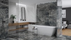 Elegantní koupelna s kombinací světlého a tmavého kamenného dekoru, vanou u stěny a otevřenou sprchou se skleněnou stěnou